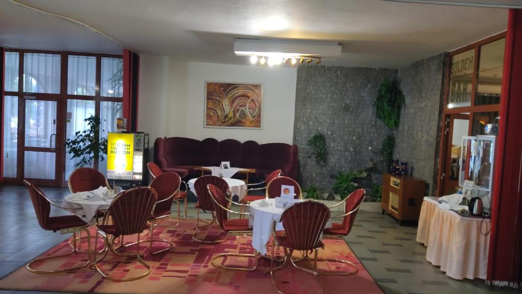 Posezení v ubytování Hotel Apollo
