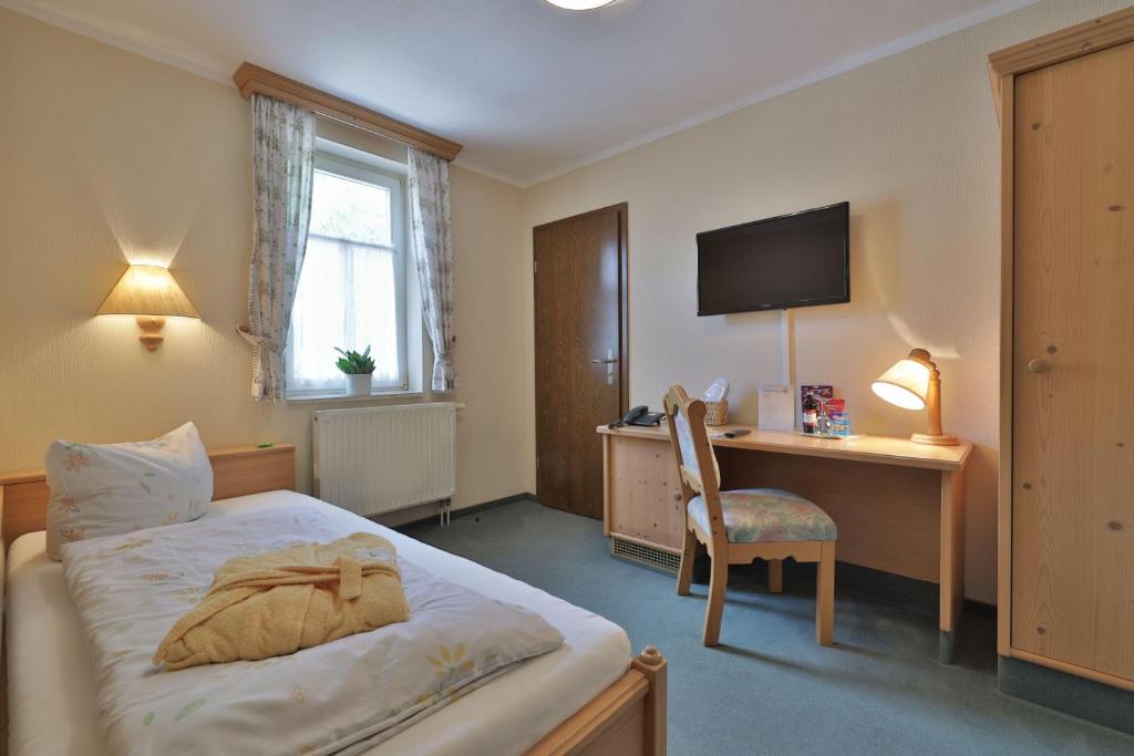 Rúm í herbergi á Hammermühle Hotel & Gesundheitsresort