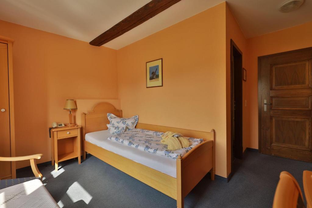 Rúm í herbergi á Hammermühle Hotel & Gesundheitsresort