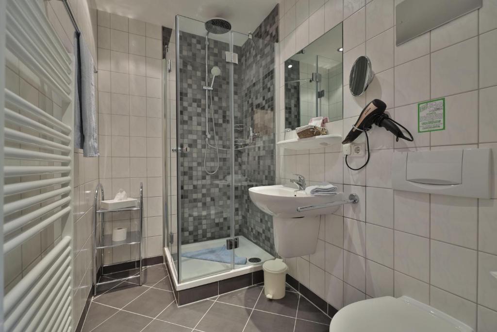 Baðherbergi á Hammermühle Hotel & Gesundheitsresort