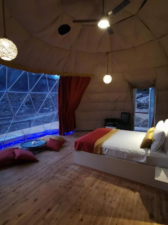 Türkdomes Glampingにあるベッド