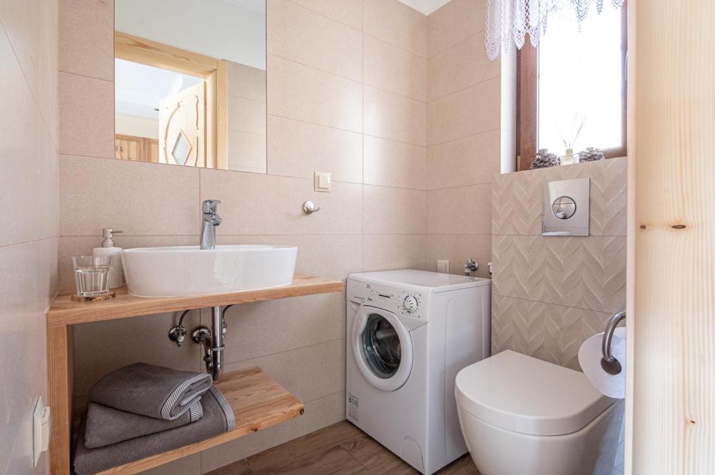 Koupelna v ubytování Osada LUX-HOUSE & SAUNA