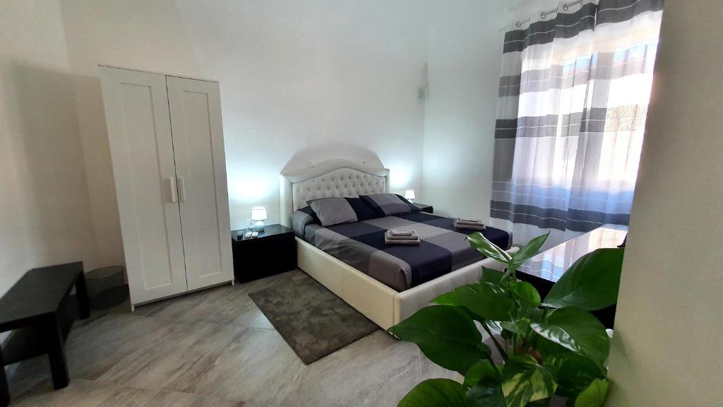 Postel nebo postele na pokoji v ubytování rooms cris