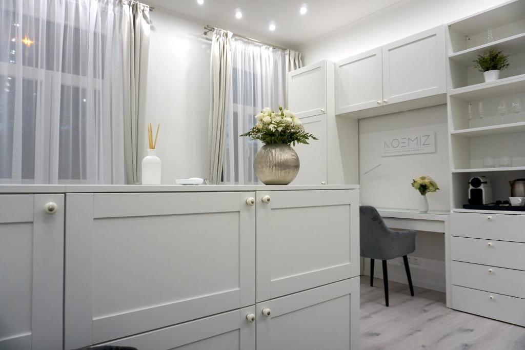 Kuchyňa alebo kuchynka v ubytovaní Noemiz Exclusive Apartments