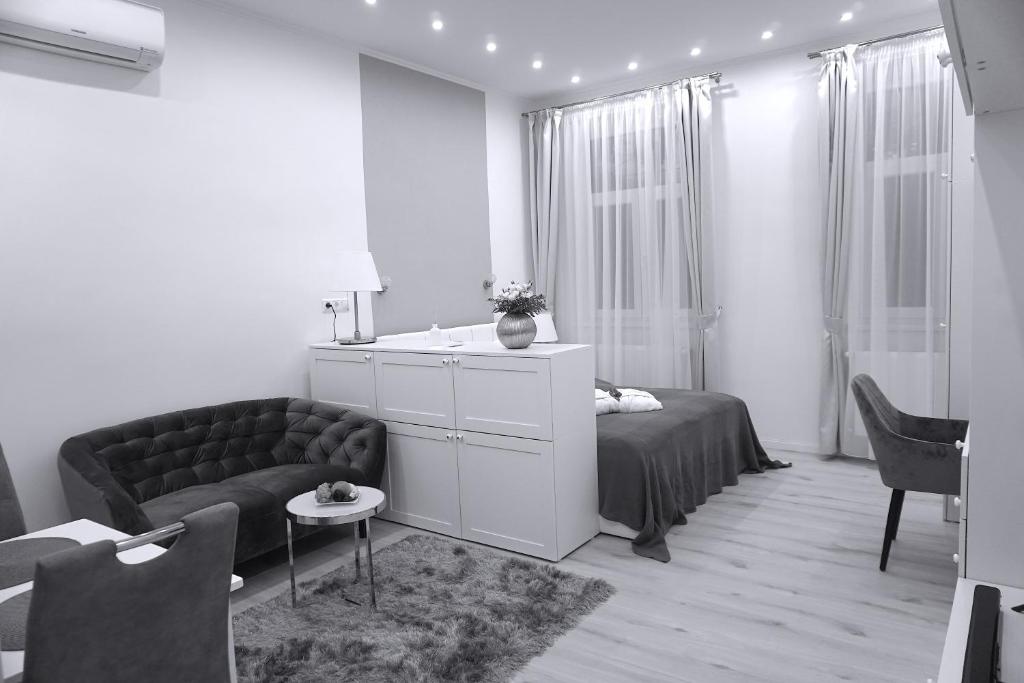Posedenie v ubytovaní Noemiz Exclusive Apartments