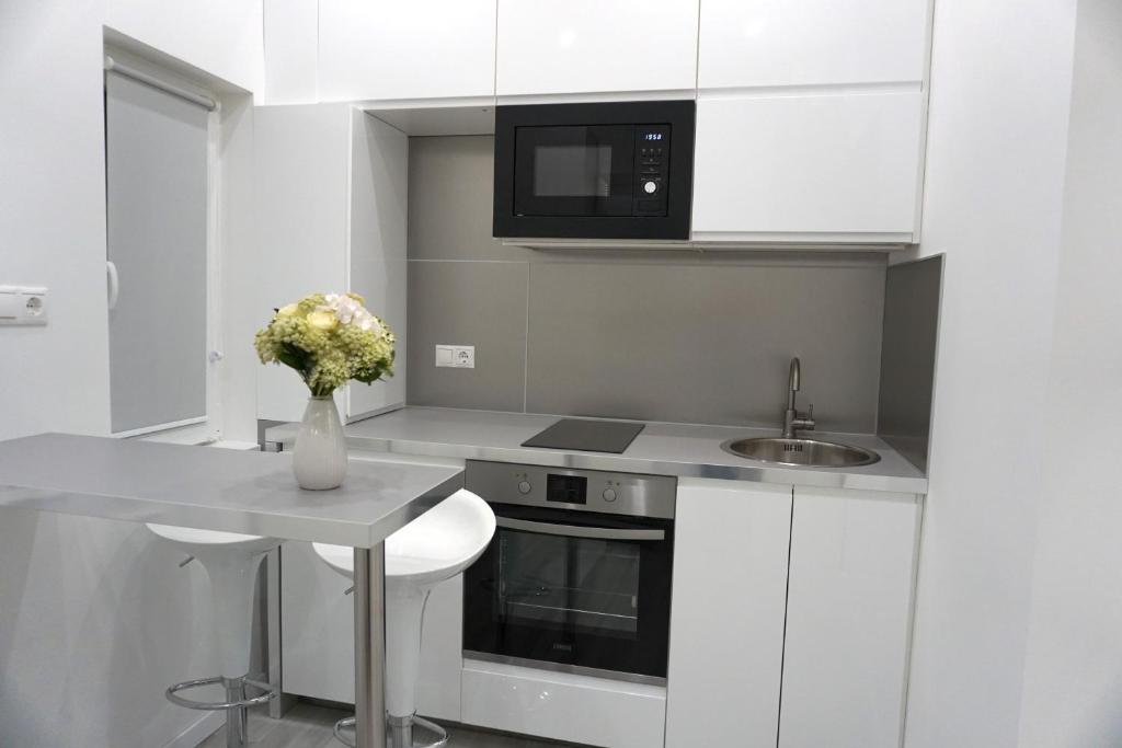 Kuchyňa alebo kuchynka v ubytovaní Noemiz Exclusive Apartments