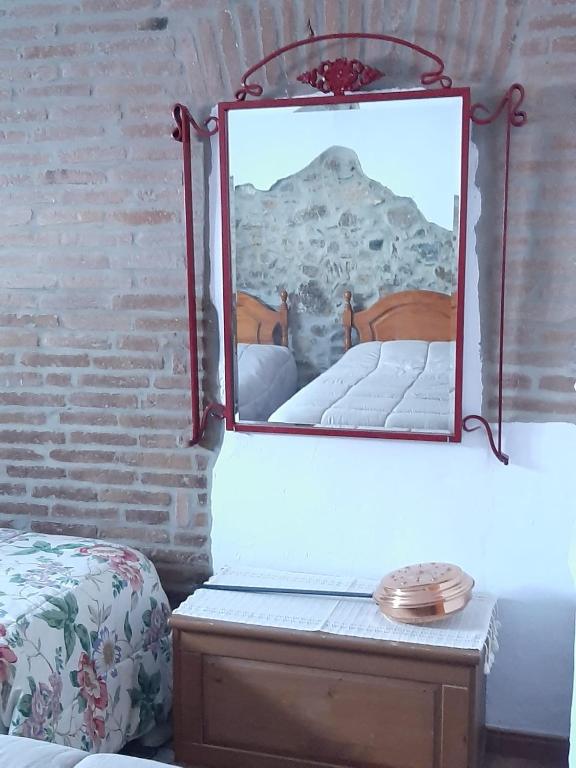 Postel nebo postele na pokoji v ubytování TIO TESORO