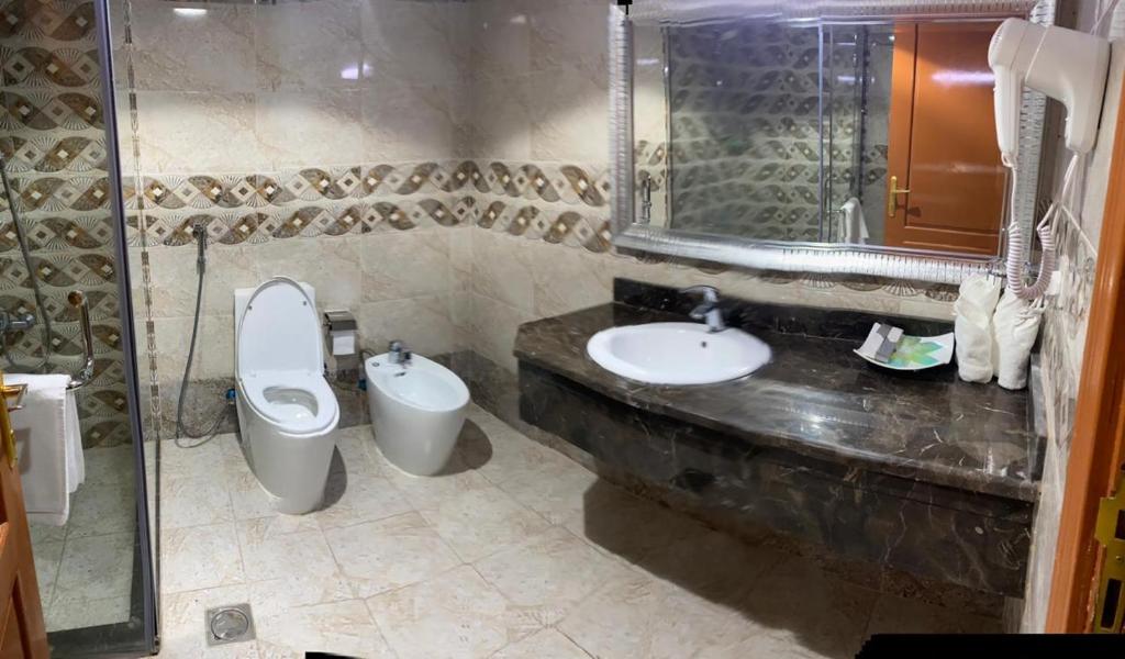 Koupelna v ubytování Al Massa Hotel