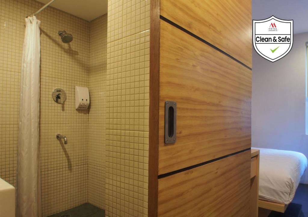 Koupelna v ubytování M Hotel