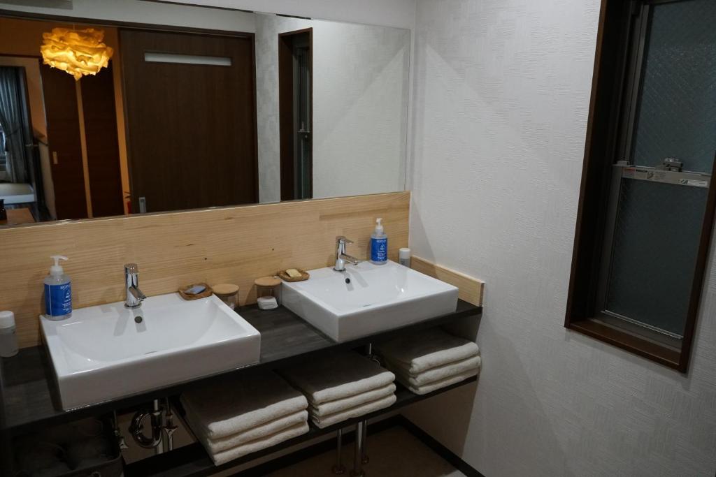 Koupelna v ubytování Auberge du Tanuki Noir Maison d'Hôtes