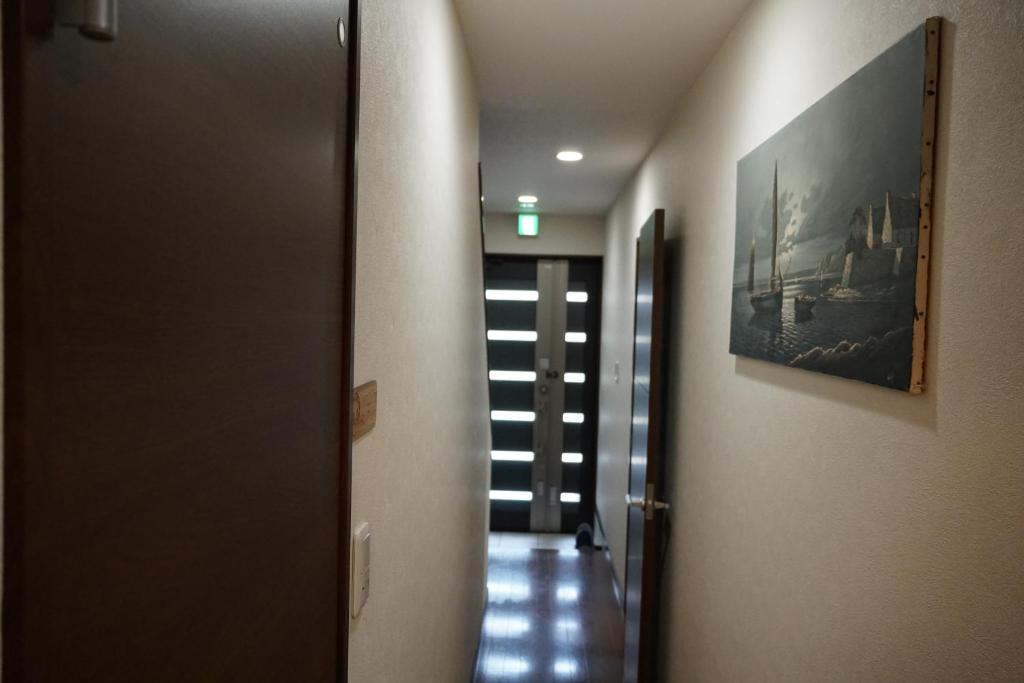 Fotografie z fotogalerie ubytování Auberge du Tanuki Noir Maison d'Hôtes v Osace