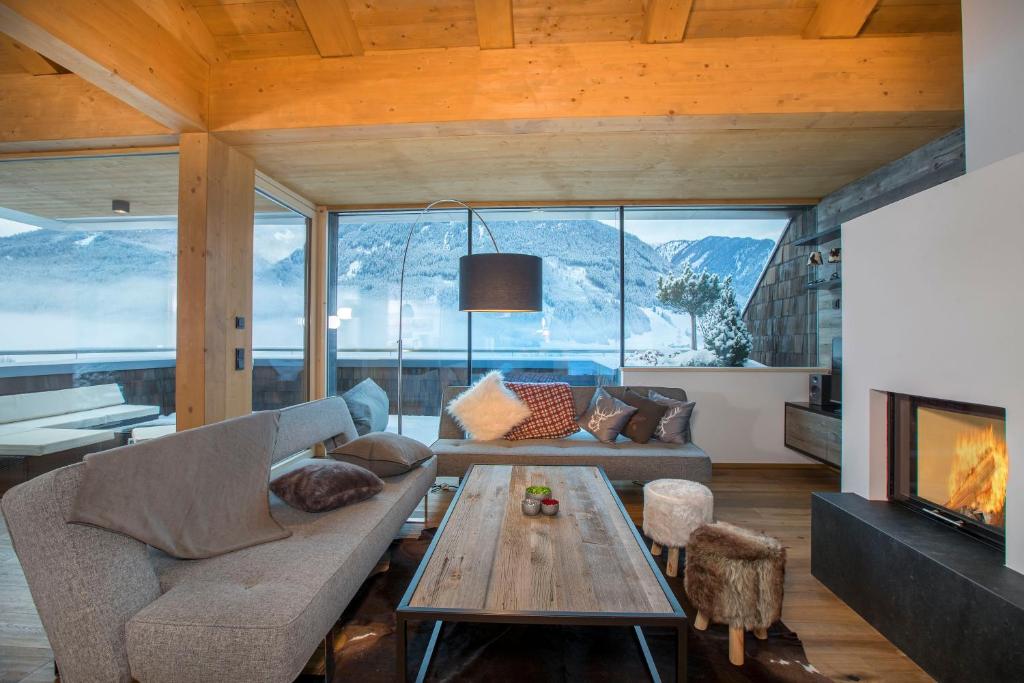 A seating area at Penthaus Kitzebüheler Alpen