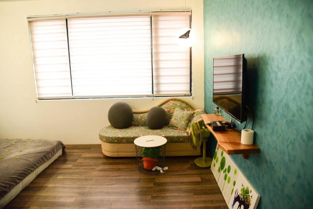 TV a/nebo společenská místnost v ubytování Living House
