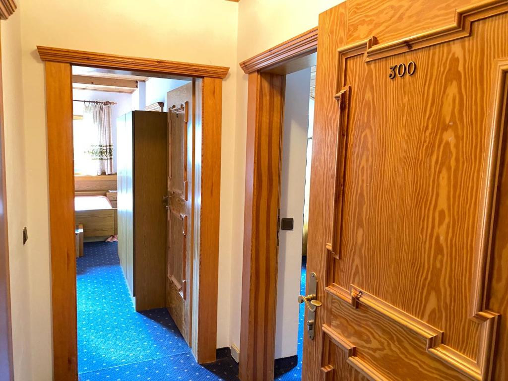 Postel nebo postele na pokoji v ubytování Hotel Friedemann