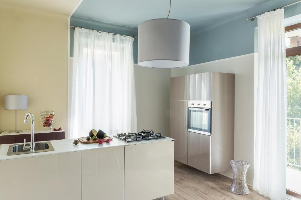 Kuchnia lub aneks kuchenny w obiekcie San Leonardo Suites