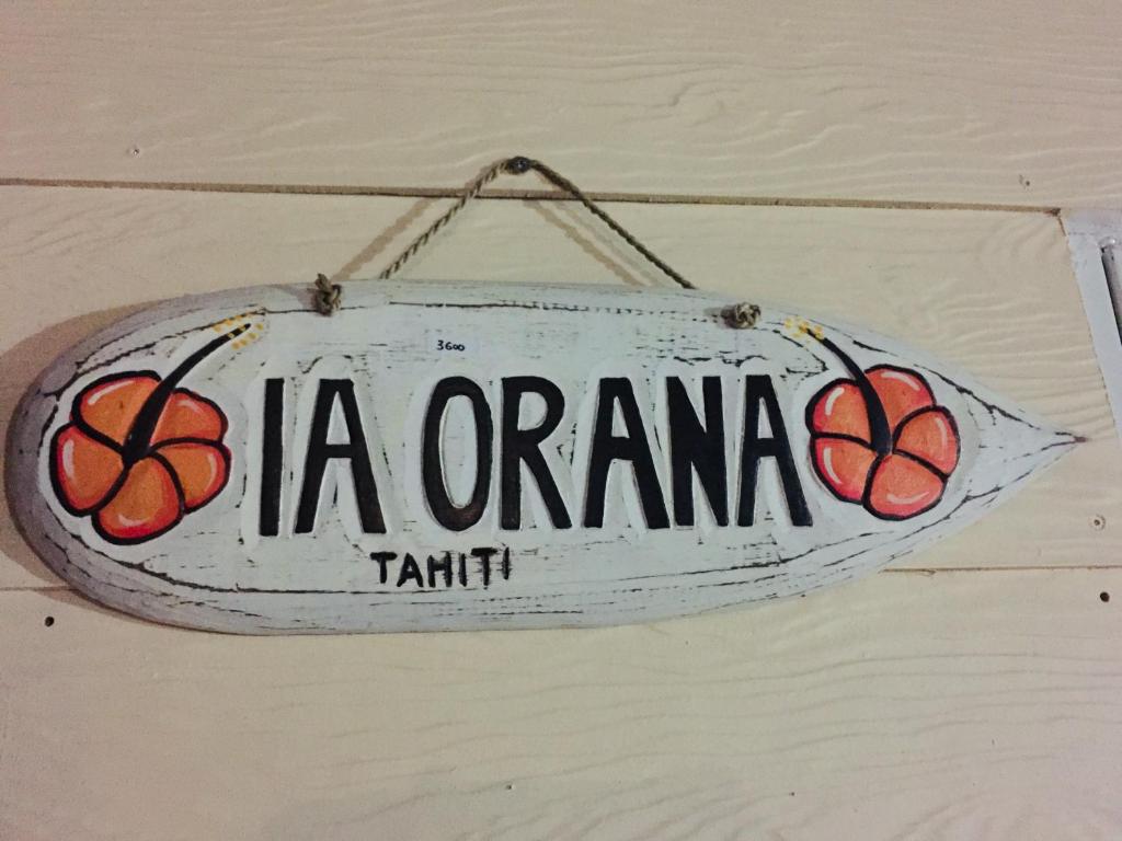 a sign that says la organica tamarin hanging on a wall at Tokerau Tahiti in Pirae