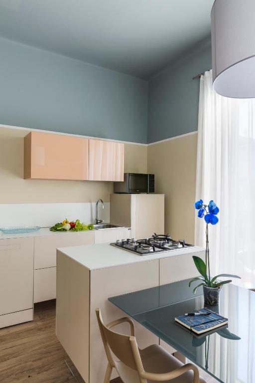 Kuchnia lub aneks kuchenny w obiekcie San Leonardo Suites