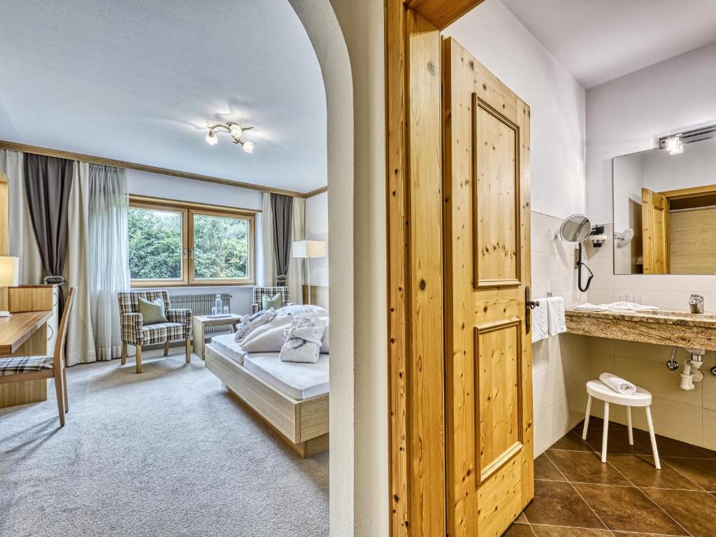 Postel nebo postele na pokoji v ubytování Hotel Traubenheim
