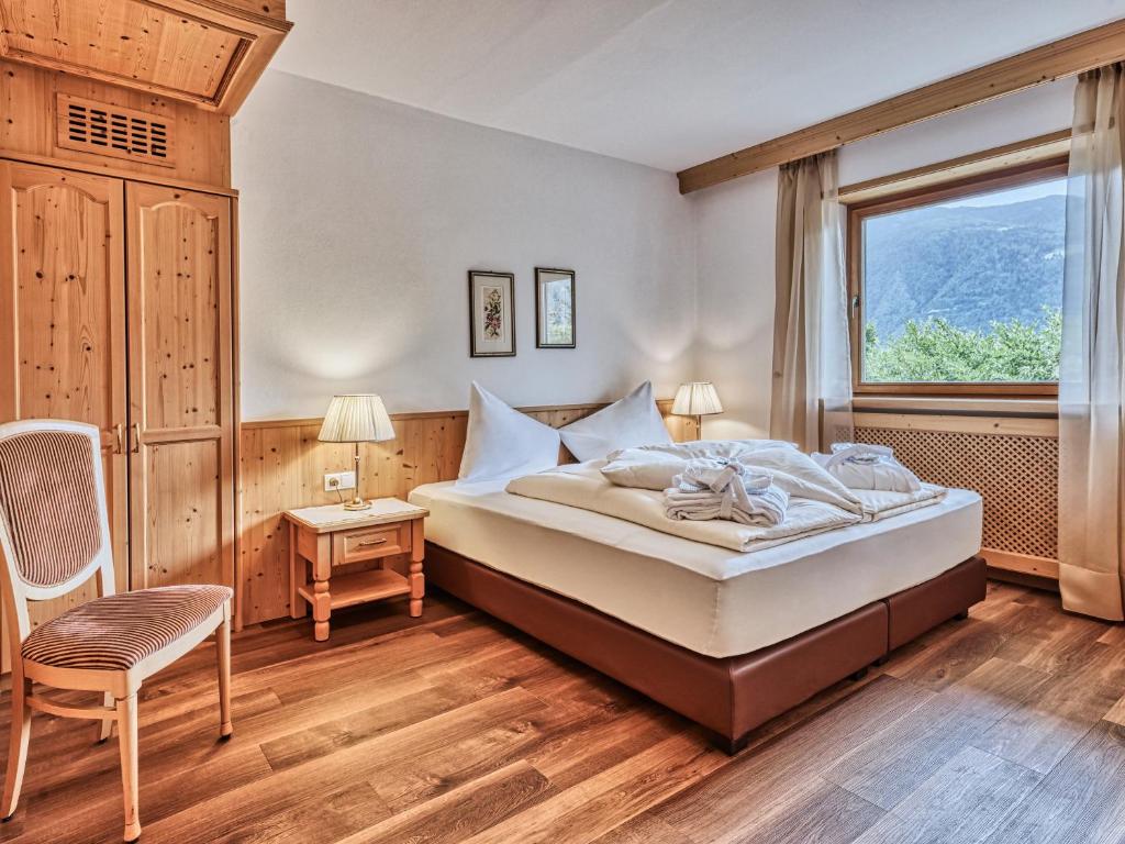 Postel nebo postele na pokoji v ubytování Hotel Traubenheim
