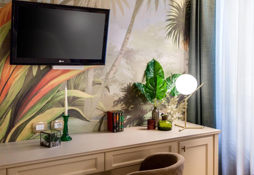 Telewizja i/lub zestaw kina domowego w obiekcie Hotel Savoia