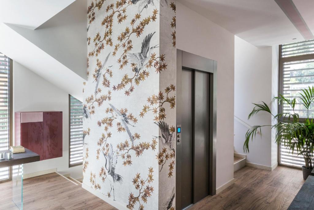 Telewizja i/lub zestaw kina domowego w obiekcie San Leonardo Suites