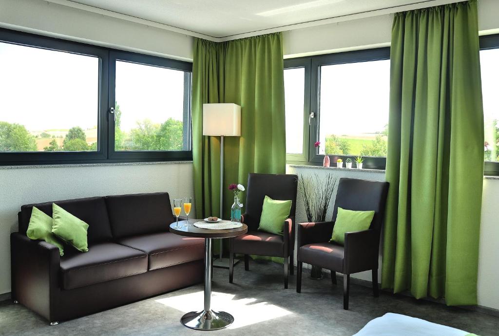 Posezení v ubytování Motel am Fürfelder Schloss