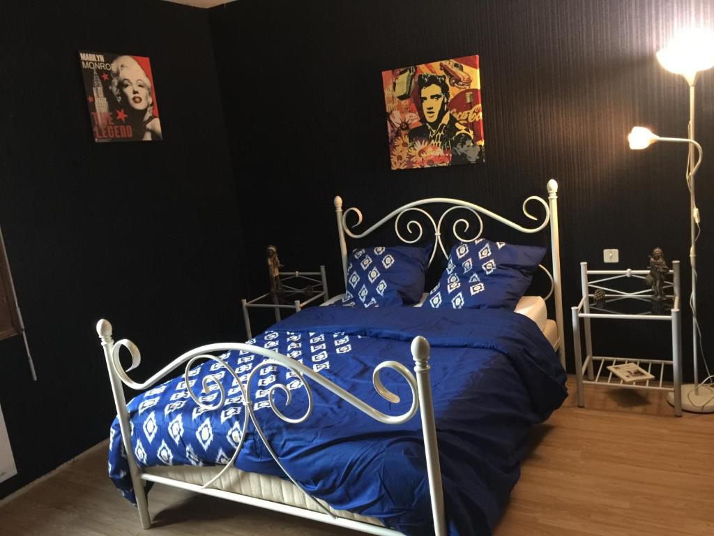 Кровать или кровати в номере Maison calme