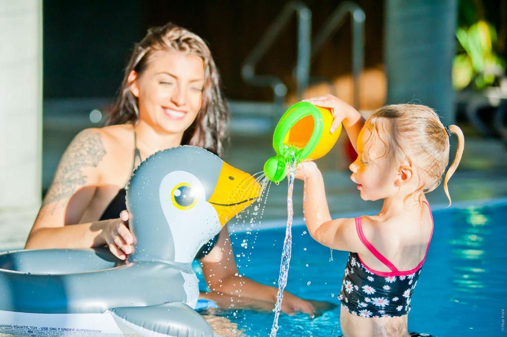 Hostia v ubytovaní Aqua Holiday Apartments Beach#Pool#Sauna no limit