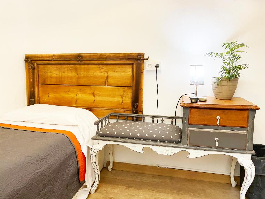 Posteľ alebo postele v izbe v ubytovaní Hostal Portugal