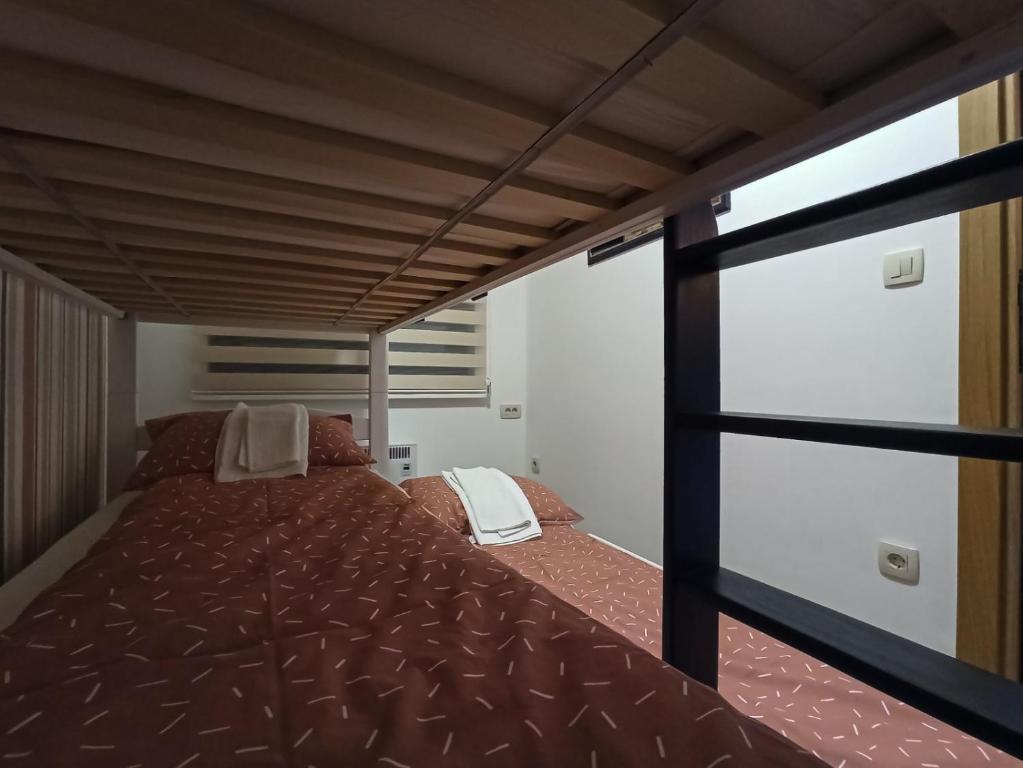 Postel nebo postele na pokoji v ubytování Apartman Relax Lux - Vila Peković