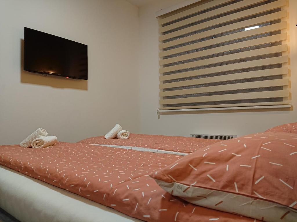 Postel nebo postele na pokoji v ubytování Apartman Relax Lux - Vila Peković
