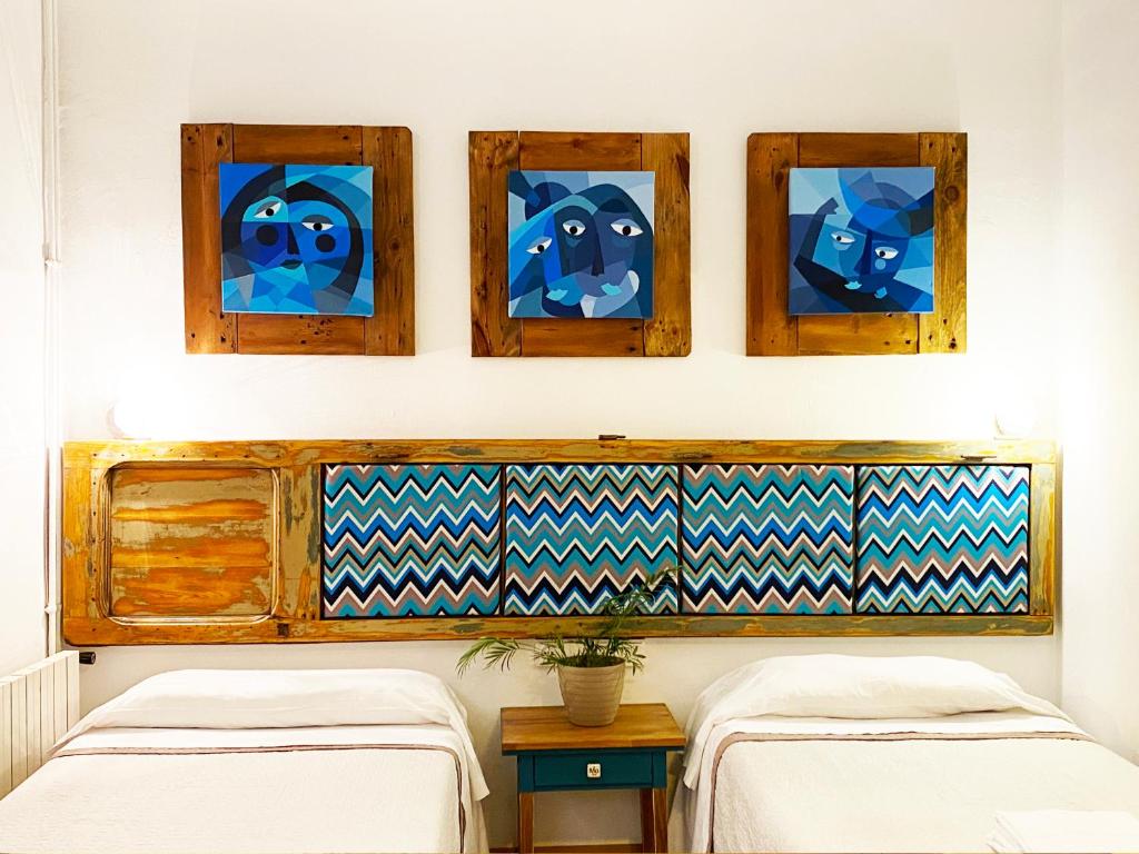 Posteľ alebo postele v izbe v ubytovaní Hostal Portugal