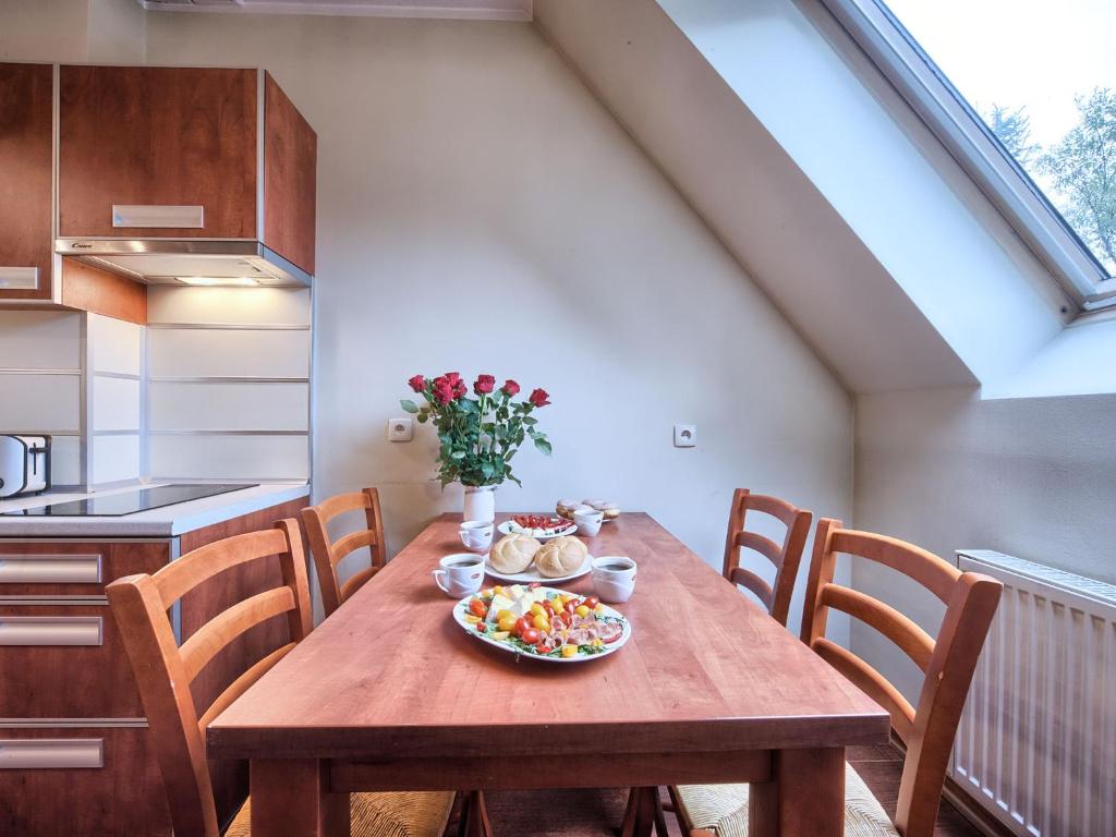 Kuchyňa alebo kuchynka v ubytovaní VisitZakopane - Amber Apartment