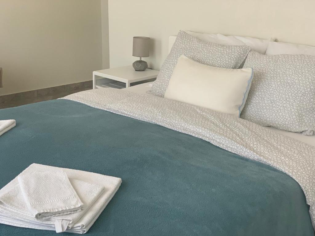 Postel nebo postele na pokoji v ubytování Lux House Olga