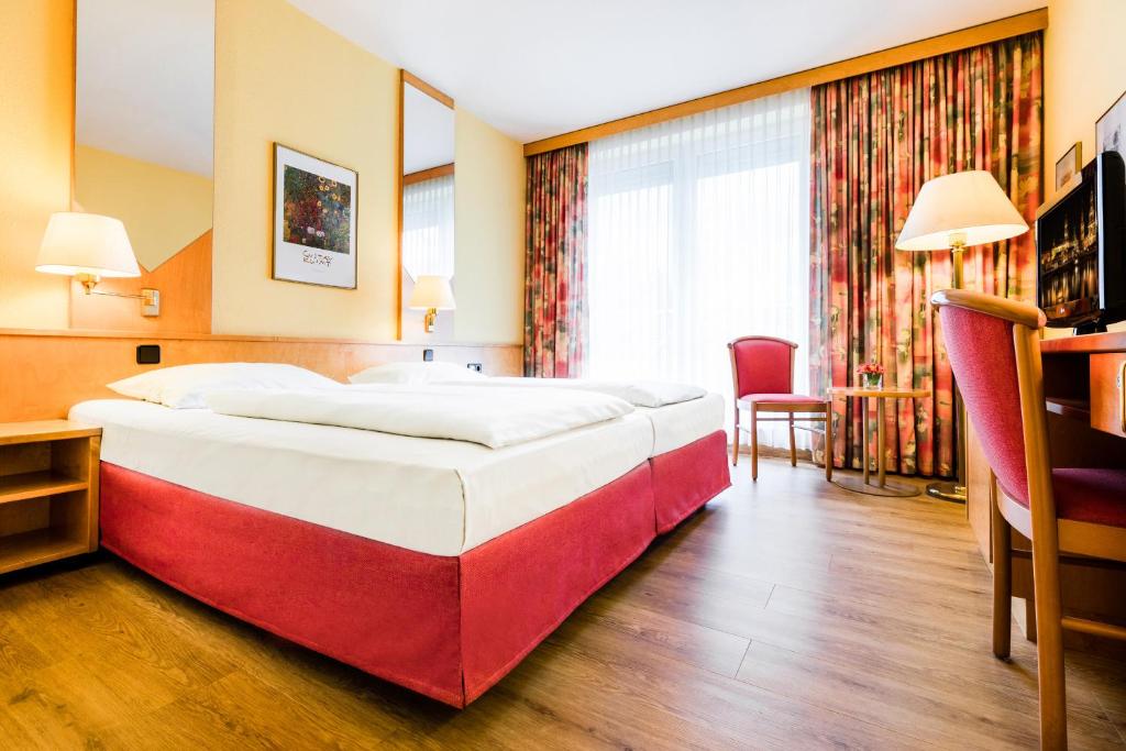 Postel nebo postele na pokoji v ubytování Taste Hotel Dresden-ehemals Residenz Alt Dresden