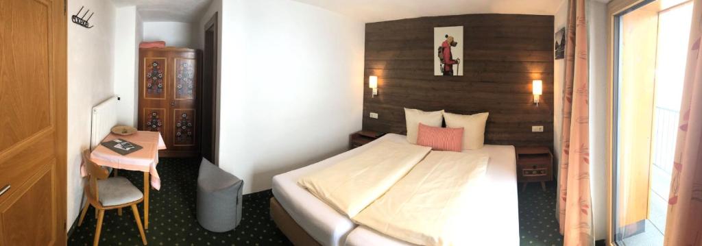 Posteľ alebo postele v izbe v ubytovaní Nonas B&B