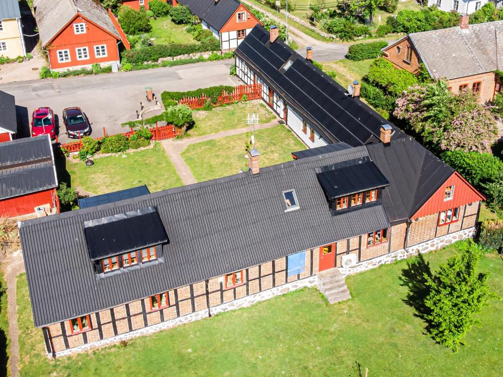 an aerial view of a house with a roof at Ravlunda Byaväg 12 in Kivik