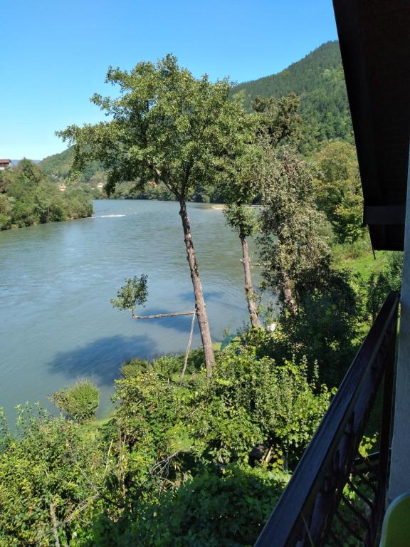 a view of a river from a balcony at Vikendica pored Drine Foča in Handići