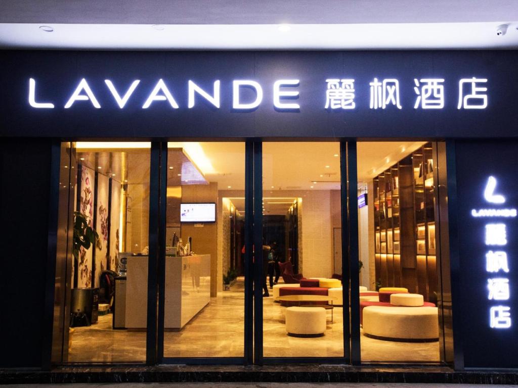 a store front of a furniture store with a sign on it at Lavande Hotel (Nanchang West Railway Station Square Branch) in Nanchang