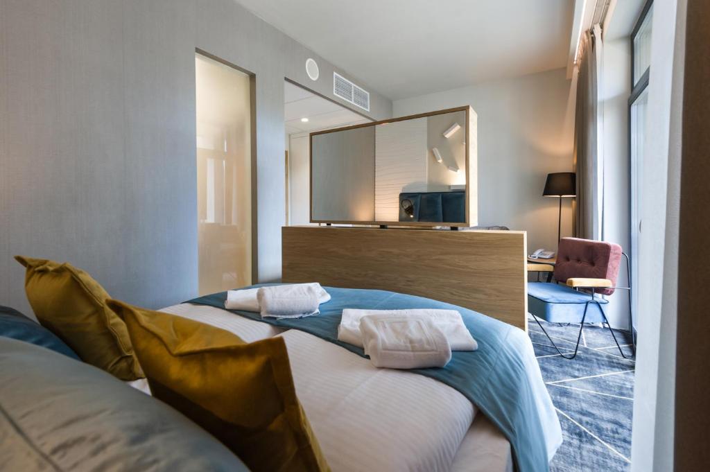 Postel nebo postele na pokoji v ubytování Hotel Zalewski