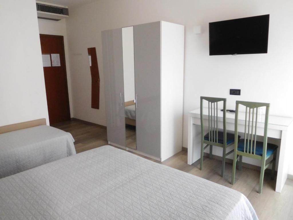 Postel nebo postele na pokoji v ubytování Hotel Emperador