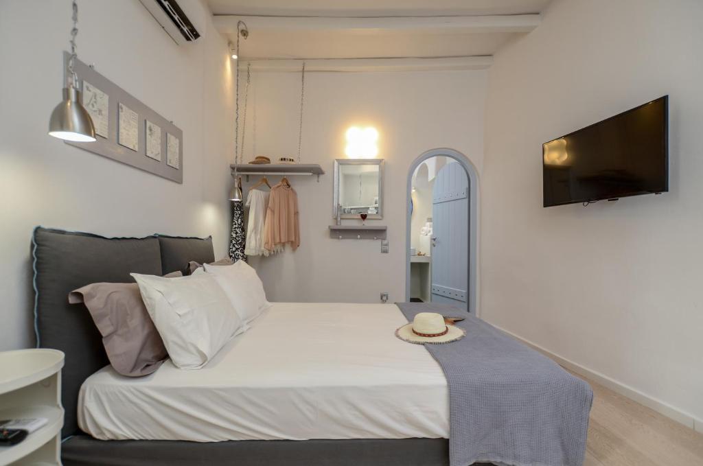Postel nebo postele na pokoji v ubytování Venetian Suites