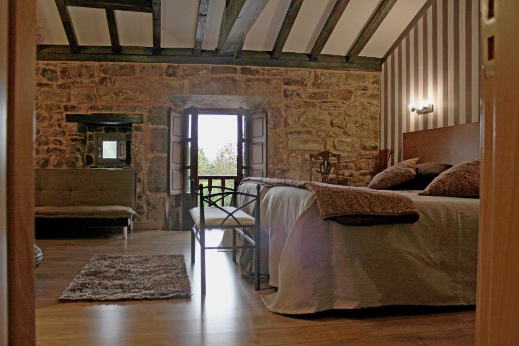 Postel nebo postele na pokoji v ubytování Posada Ormas