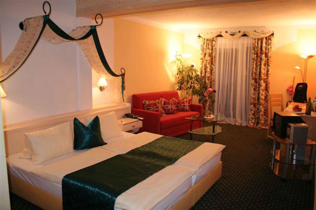 Postel nebo postele na pokoji v ubytování Hotel Waldesruh