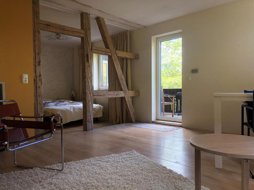 Postel nebo postele na pokoji v ubytování Familienpension Obere Juchhe, Ferienwohnung und Zimmer