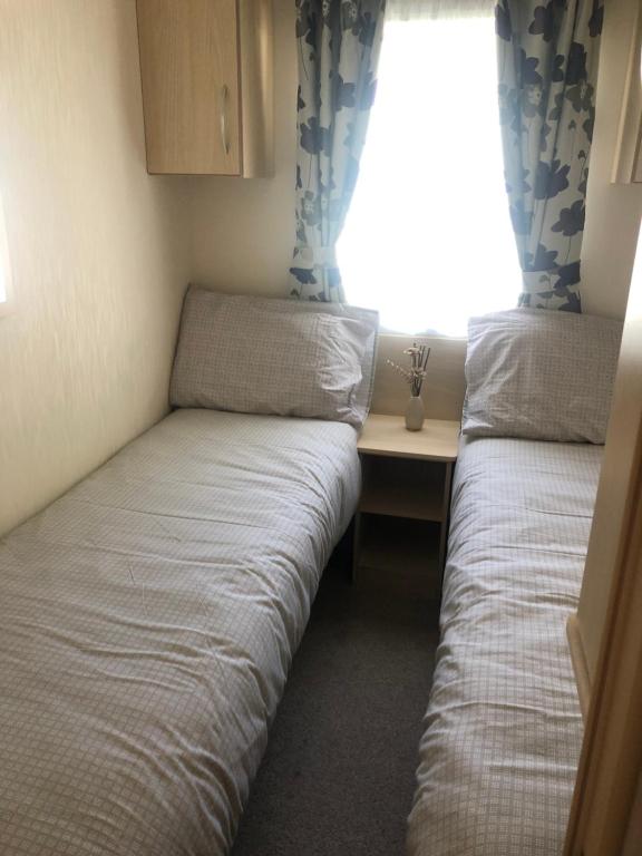 Voodi või voodid majutusasutuse Seton sands static holiday home - sleeps 6 toas