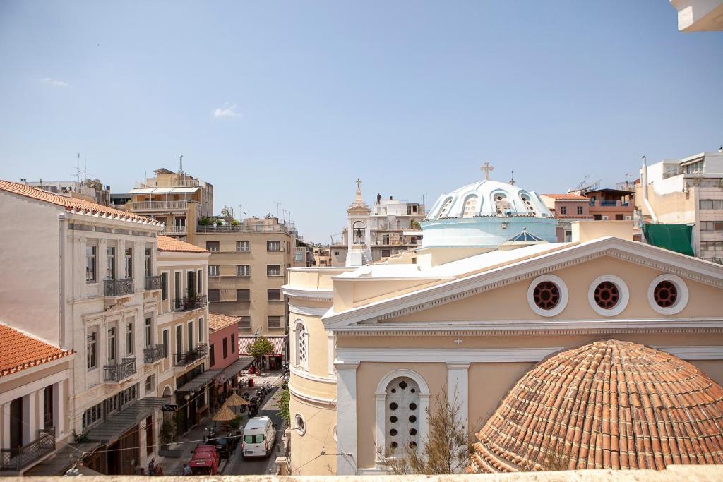 a building with a dome on top of it at Athens 1890 Hotel & Spa in Athens