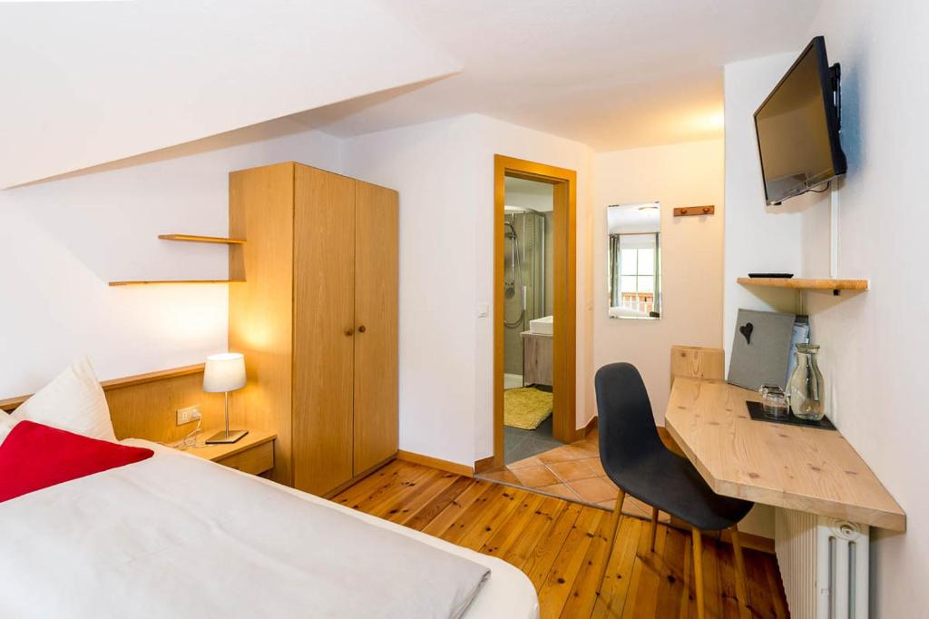 TV a/nebo společenská místnost v ubytování Haus Claudia B&B