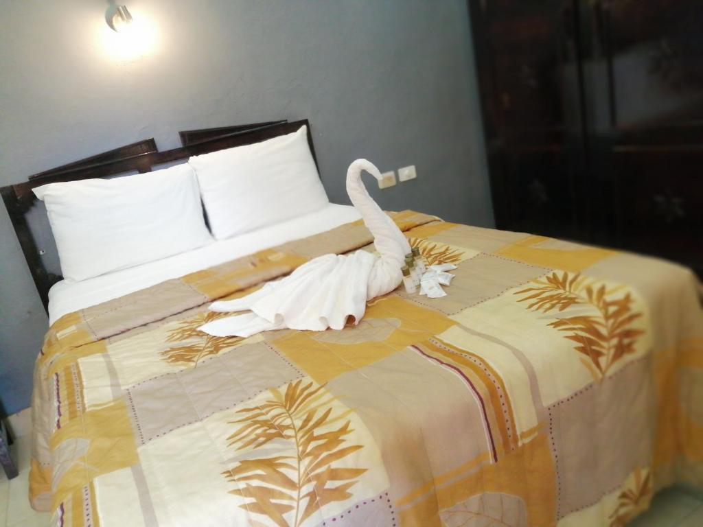 Postel nebo postele na pokoji v ubytování Hotel Montejo