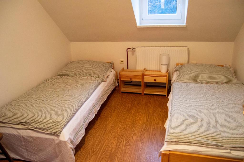 Postel nebo postele na pokoji v ubytování Penzion Holacký